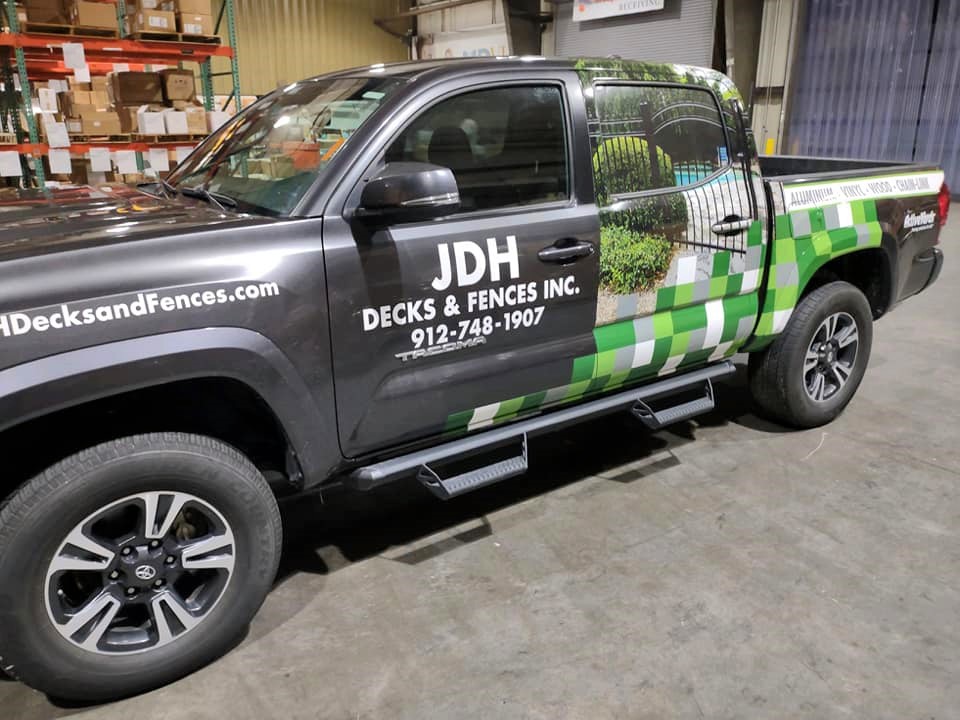 Photo of a JDH Fence Company truck