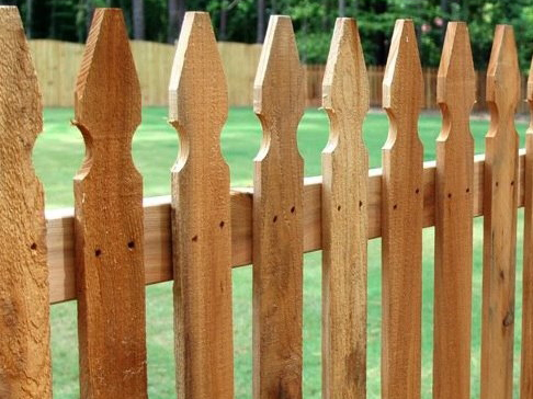 Photo of a wood picket fence